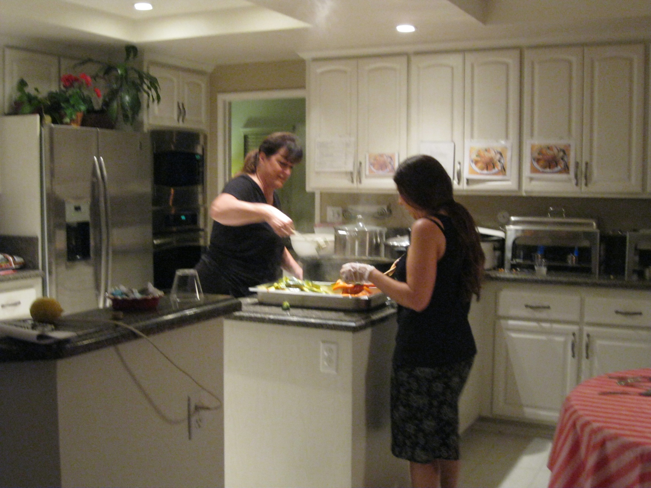 Jody and Jennifer scampered to get the food plated and ready to serve