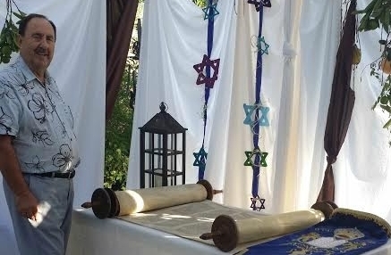 Rich admires the Torah Scroll