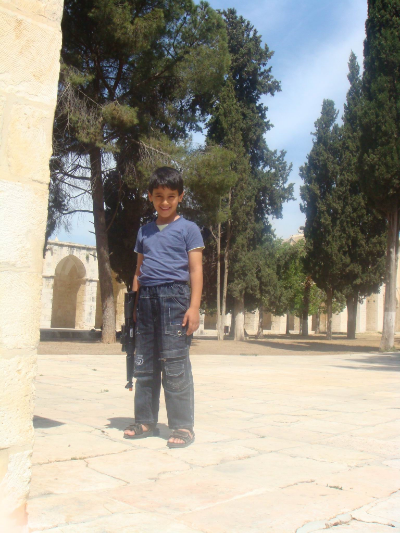 A young boy with a rifle allowed me to take his picture on the temple mount