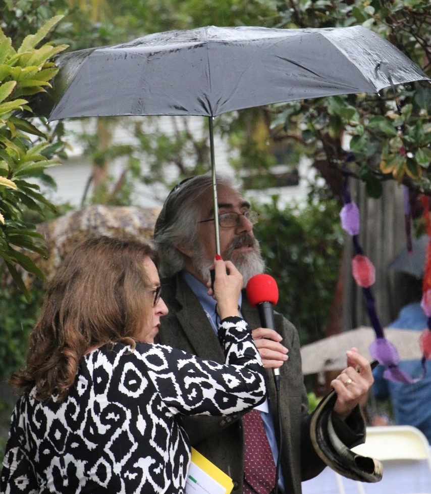 Cris demonstrated the blowing of the shofar and the waving of the etrog and lulav.