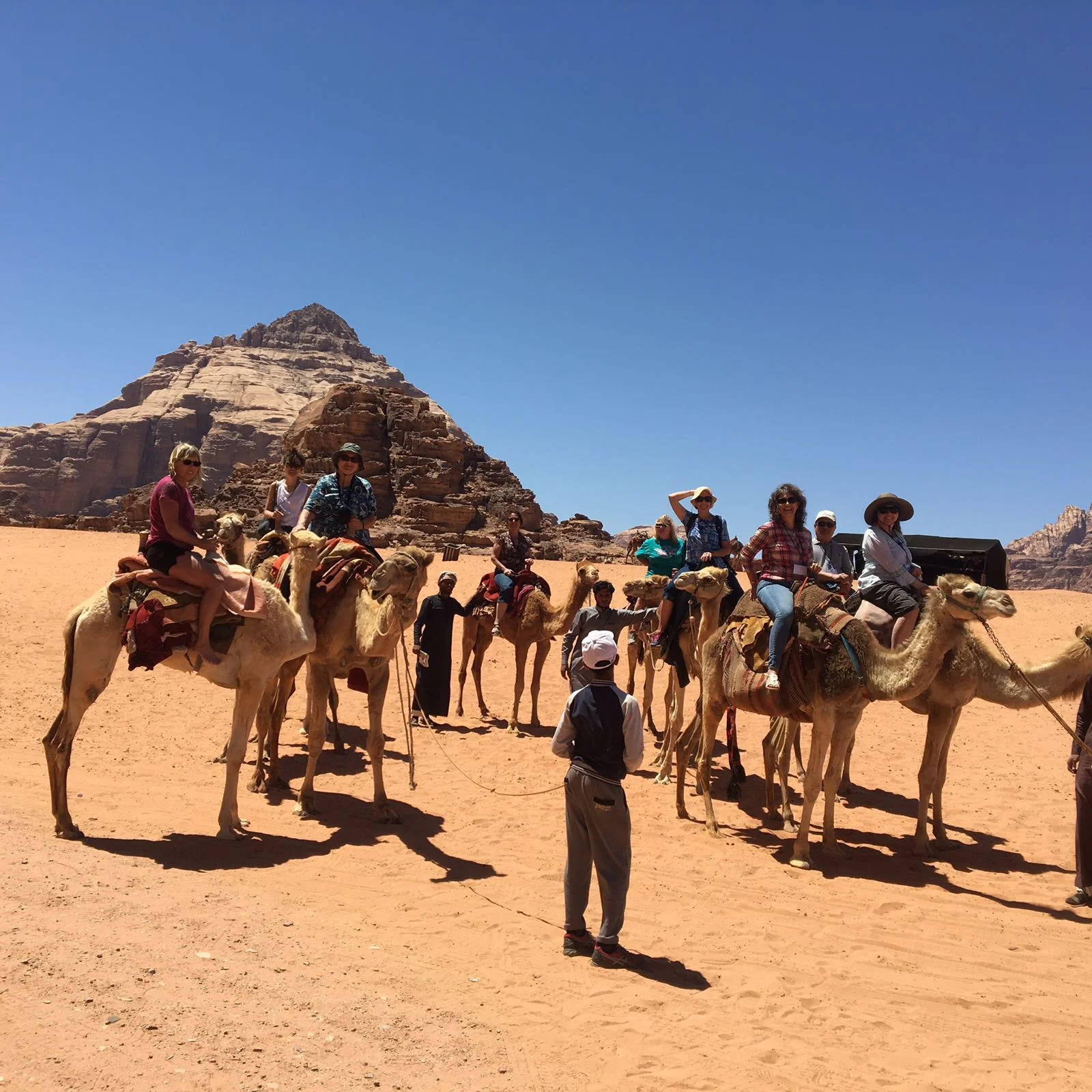 DSCN0239zl Group on camel.JPG