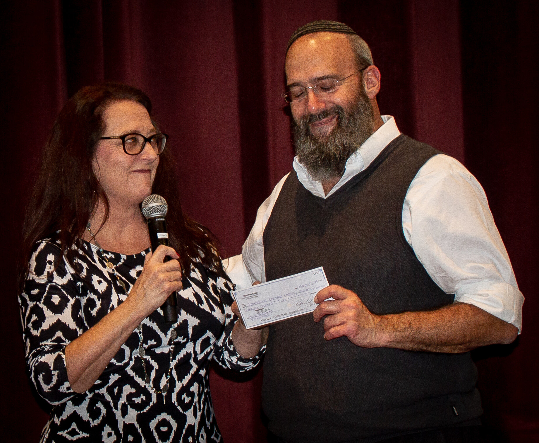  Presenting our donation check for a bomb shelter in Israel. 