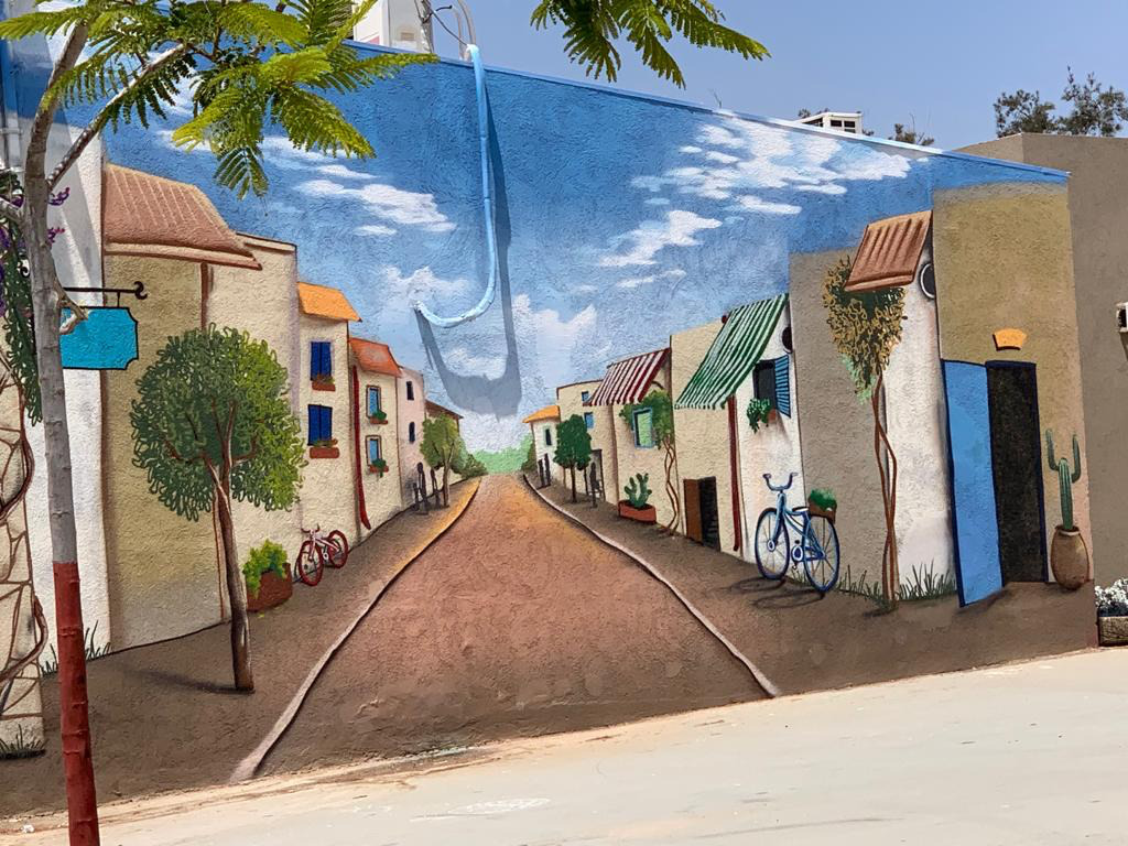  Painted mural of California on school wall at HaGaydi 
