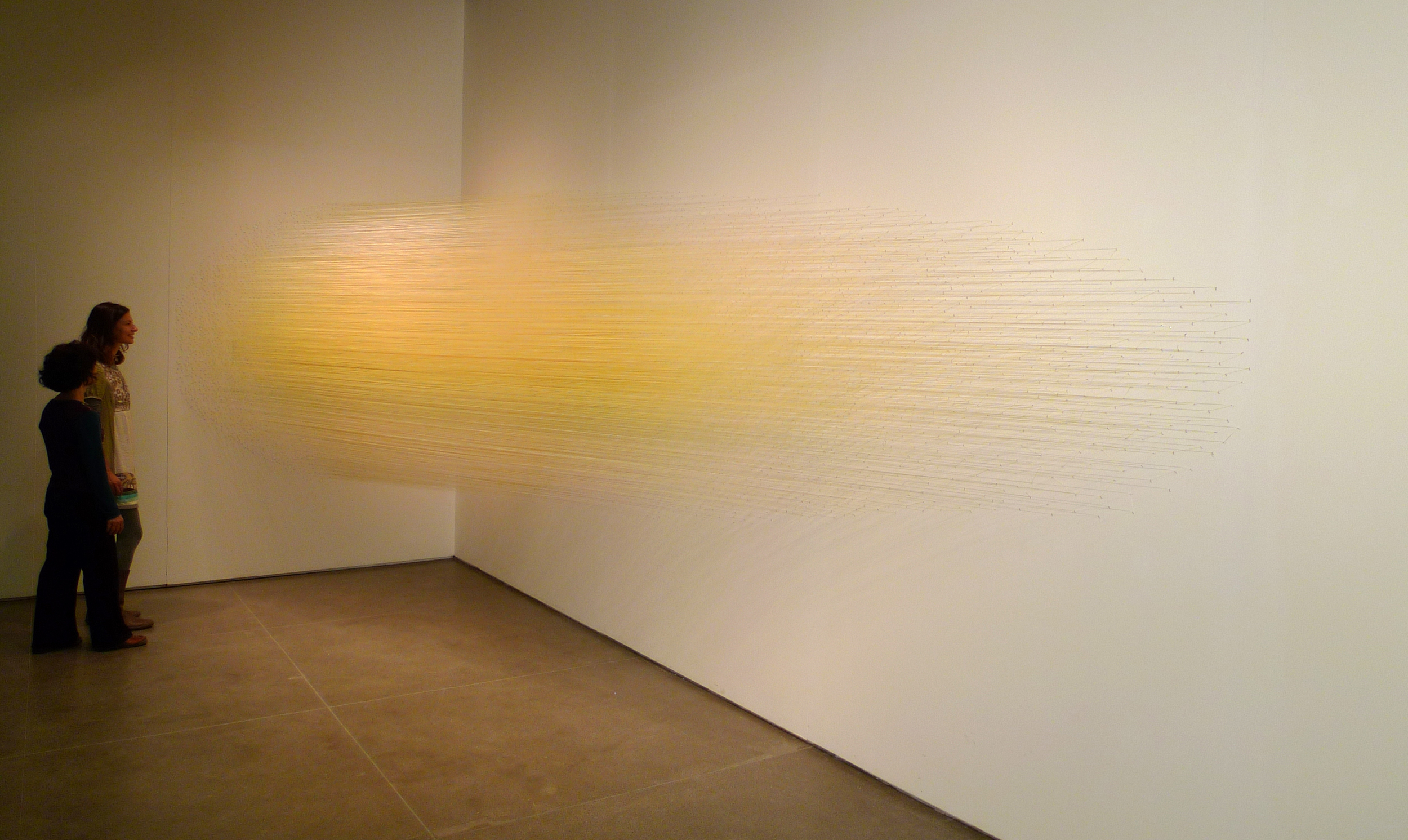    canto yellow   2011 cotton thread, staples 18 by 6 by 6 feet photography by Derek Porter 