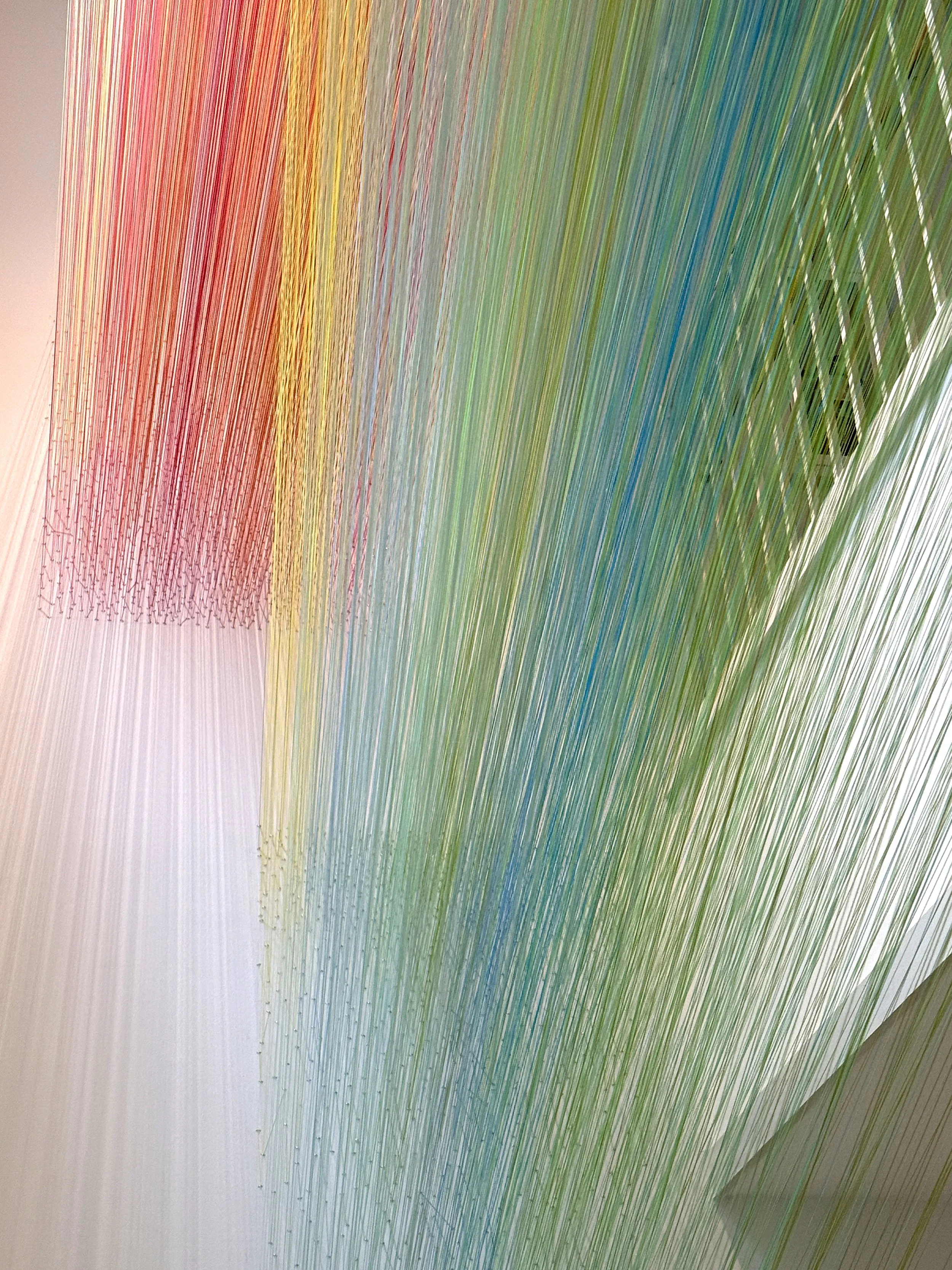    seen and unseen    (view from first floor)  2025 cotton thread and staples 180 × 180 × 48 inches 