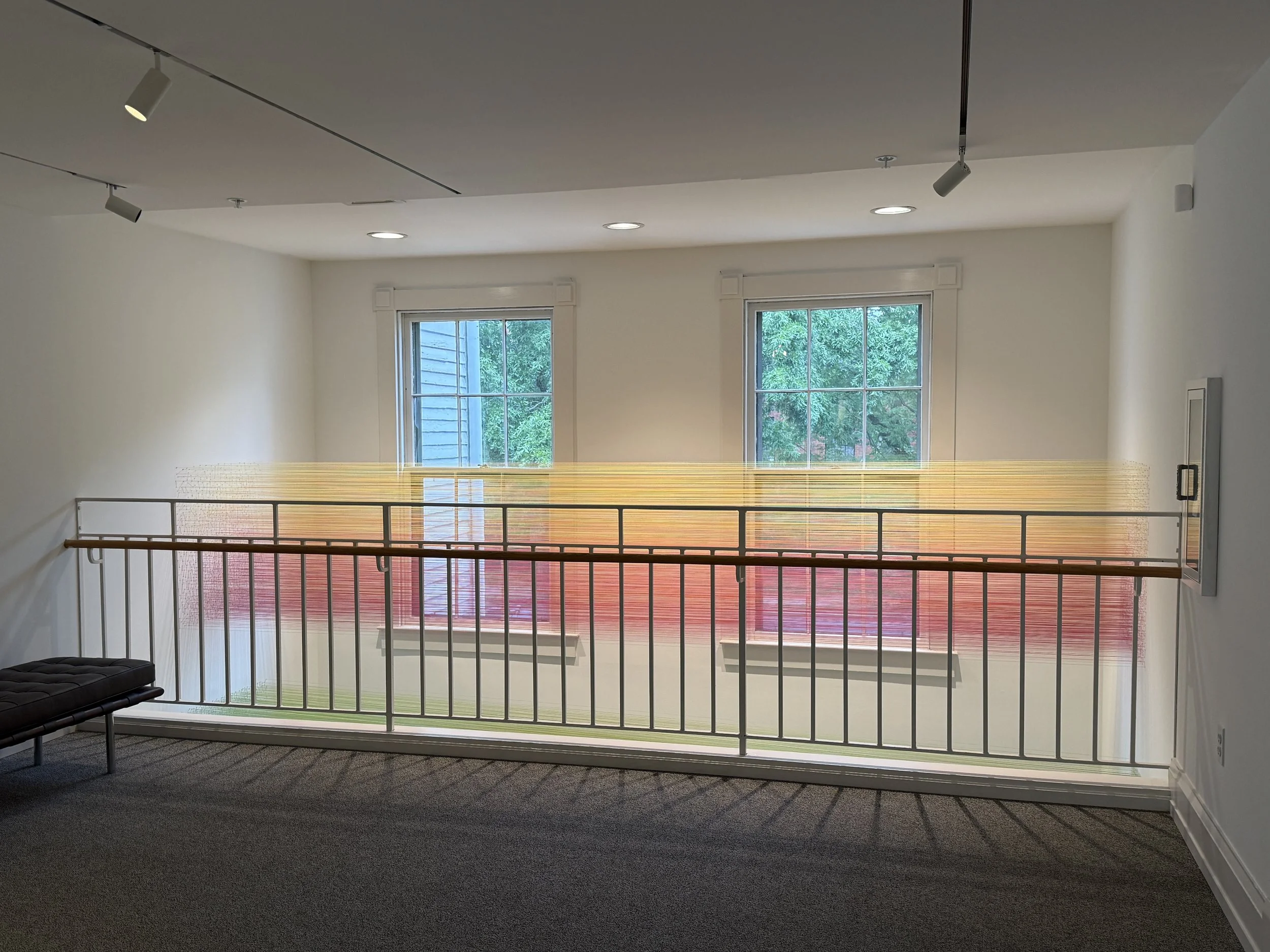    seen and unseen    (view from second floor)  2025 cotton thread and staples 180 × 180 × 48 inches 