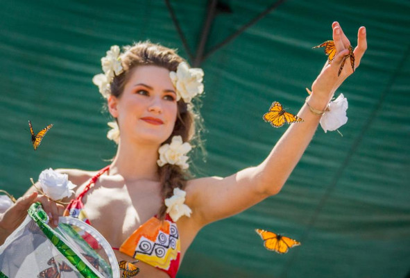 A woman releases butterflies at last year's Earth Day celebration in San Francisco. Photo courtesy of Earth Day San Francisco.