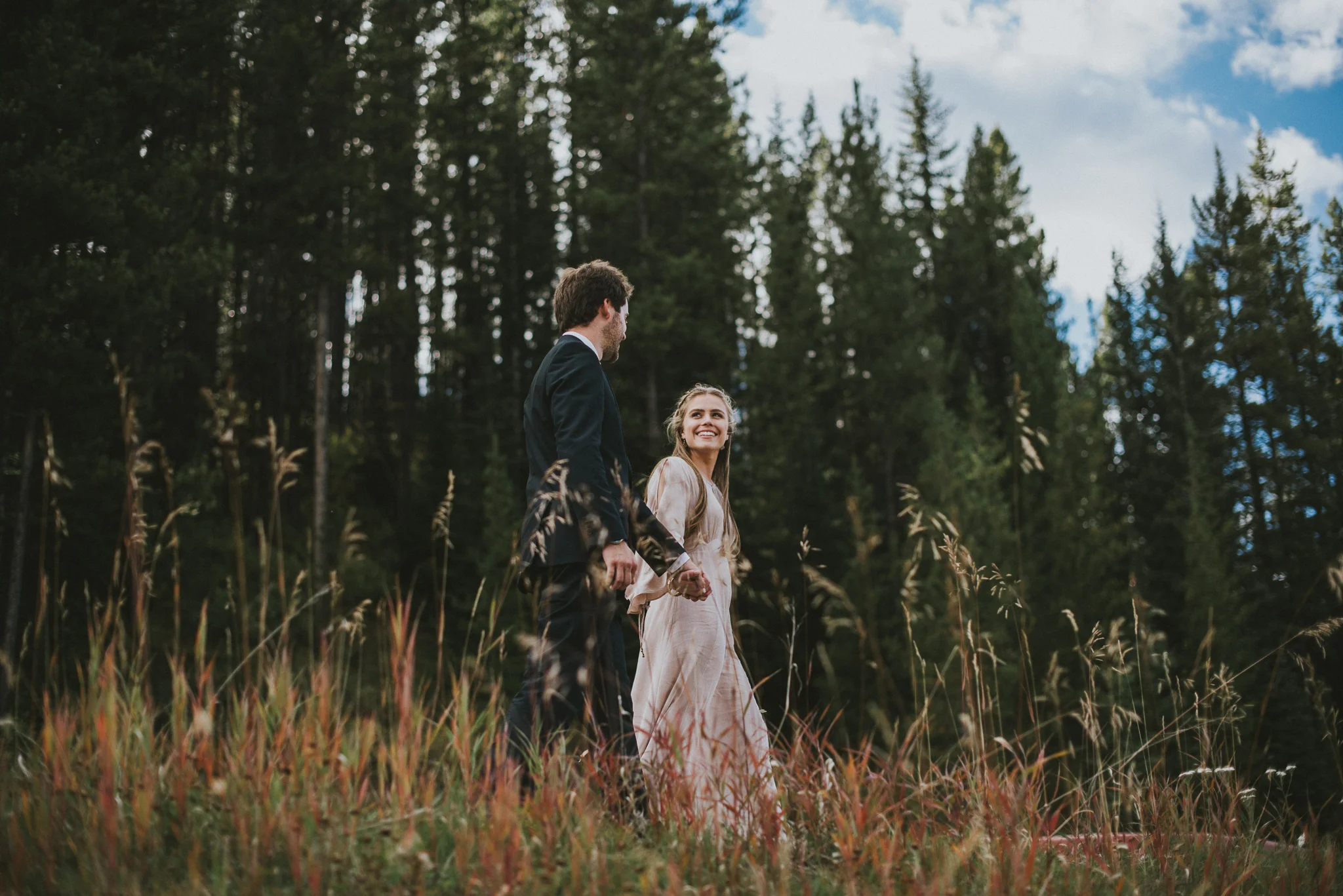 bride look groom field elopement kananaskis