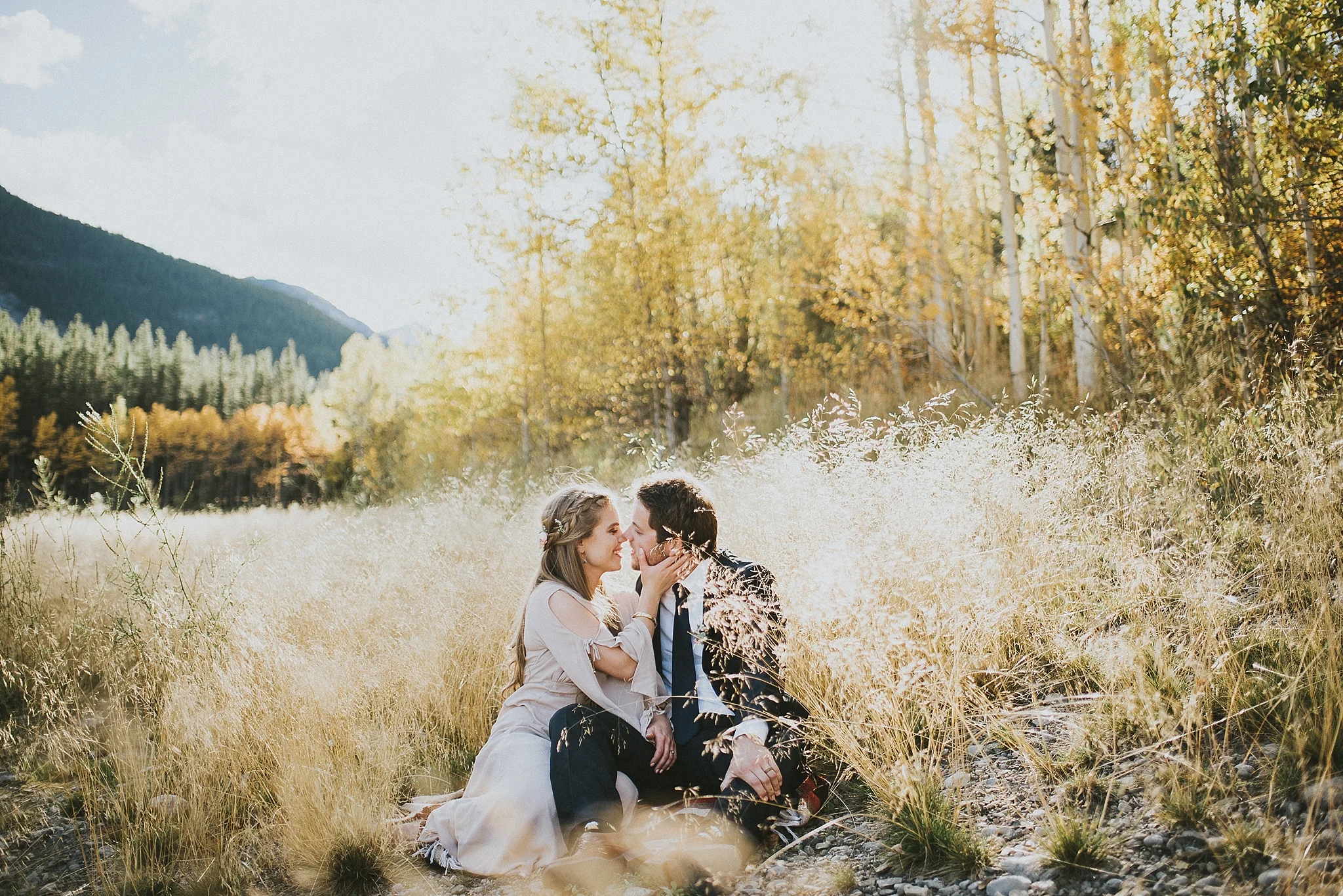 bride groom kiss field elopement portrait kananaskis