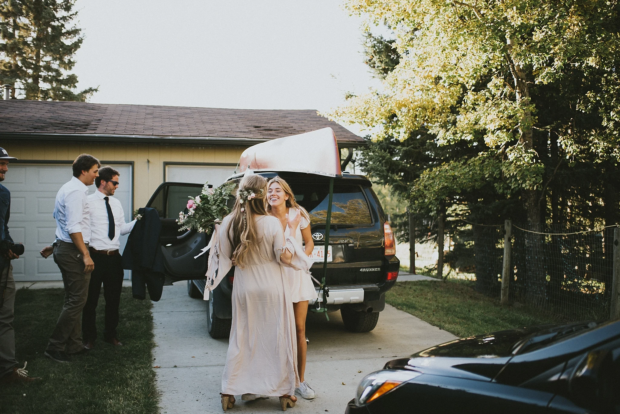 bride friend candid kananaskis elopement