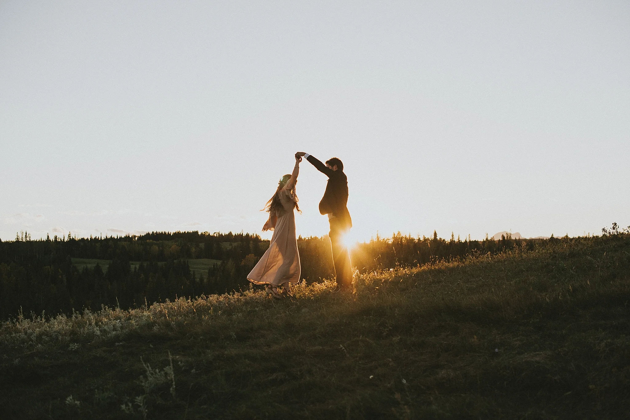 kananaskis elopement sunset bride groom dance spin