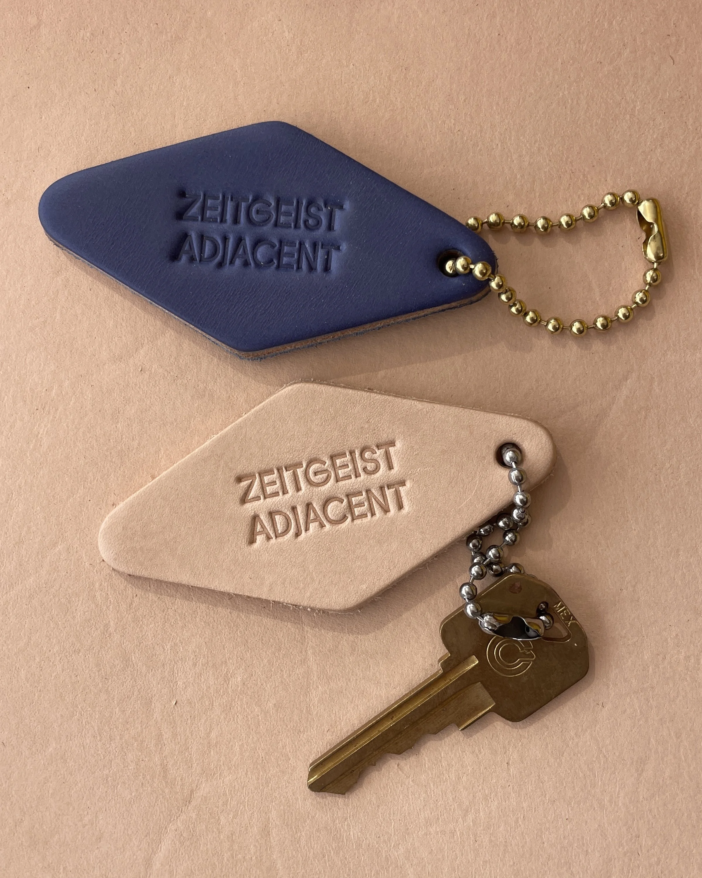 Zeitgeist Adjacent_VegTan_Cobalt_Key.jpg