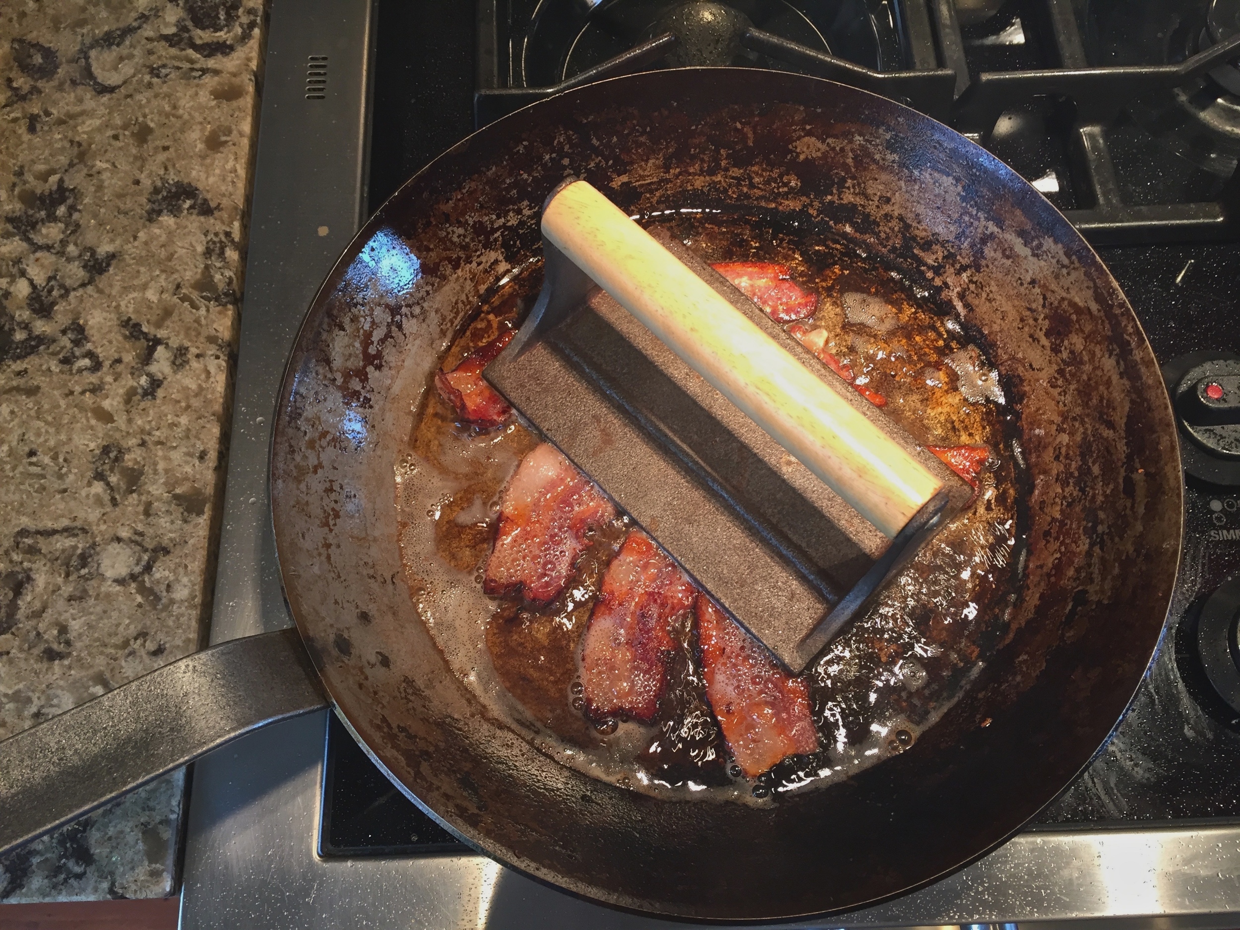 Using a bacon press-messy!