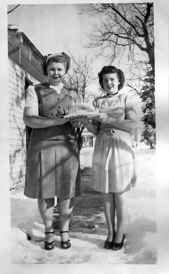 1940s-vintage-image-of-2-women-celebrating-a-birthday-in-the-winter.jpg