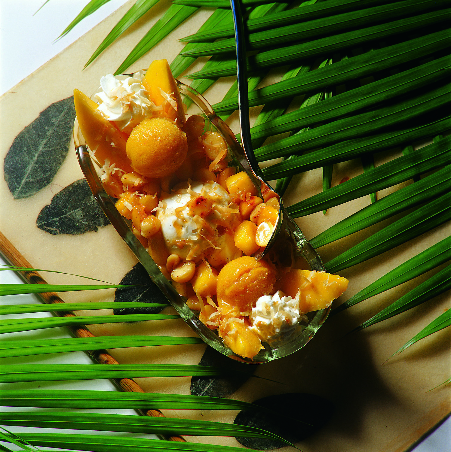 Mango Split with Rum-Caramel Sauce and Macadamia Nuts