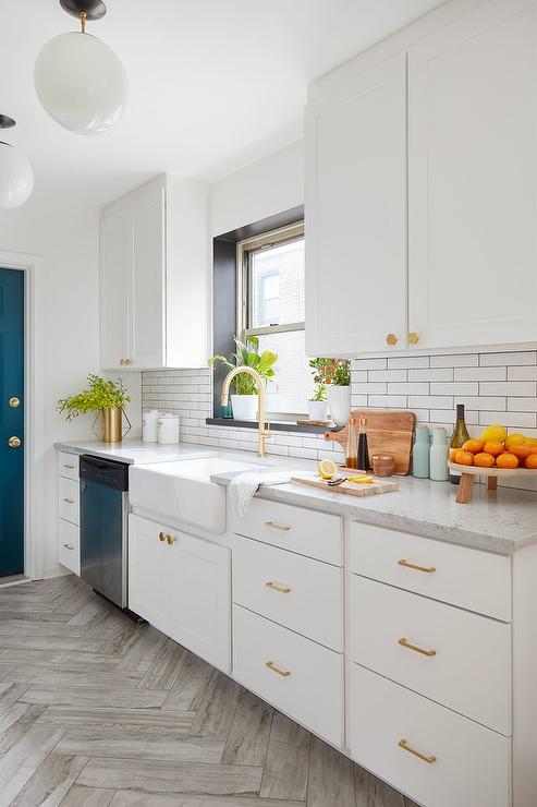 white-kitchen-gray-herringbone-floor.jpg