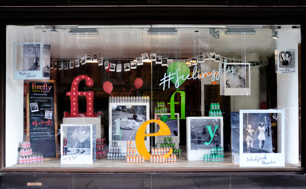 F irefly Tonics Window installation and interactive photo gallery for Firefly drinks at Whole Foods.