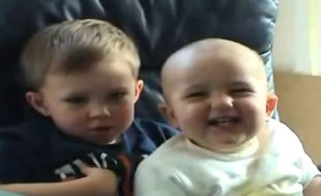Harry and Charlie in the infamous clip. From the looks of it, Charlie does not apear to be a Vampire Baby (Although his canines are in shadow.)