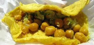 Doubles sauces include mango, shado beni (a green sauce made from a cilantro-like herb), tamarind, and pepper sauce, if desired (I like it “slight” meaning a dash, Curtis likes more)