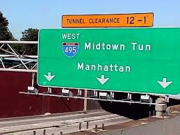  I glimpsed a sign for the Mid-town Tunnel as I zoomed past . . .