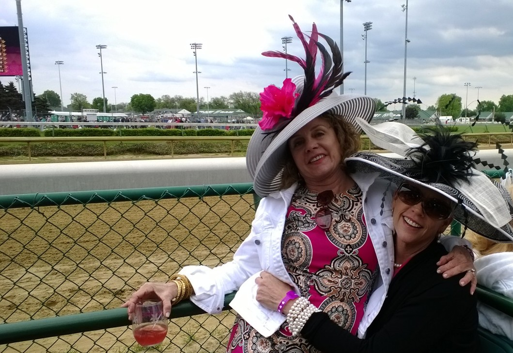 The Oaks is a charity race day to raise funds and awareness for breast cancer: It is all about the hats, too. And most every one wears pink. (I have pink on underneath my sweater, really (It was freezing at parts of the day)