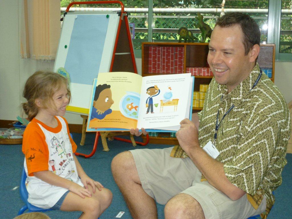Robin Barker sent this photo of her friend reading Norman to his daughter's class.