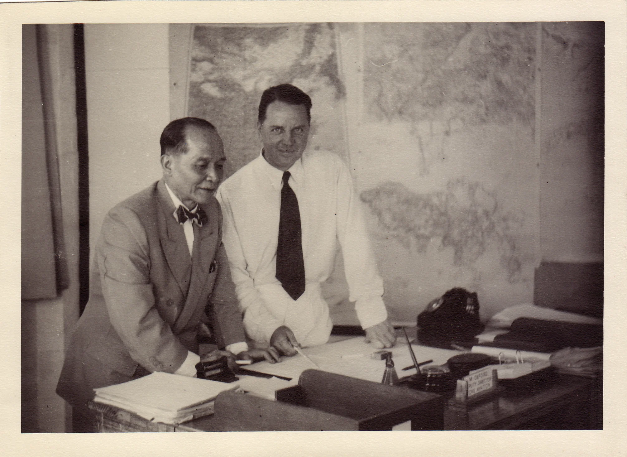 Admiral Chan visiting Max's office in the Department of Civil Aviation