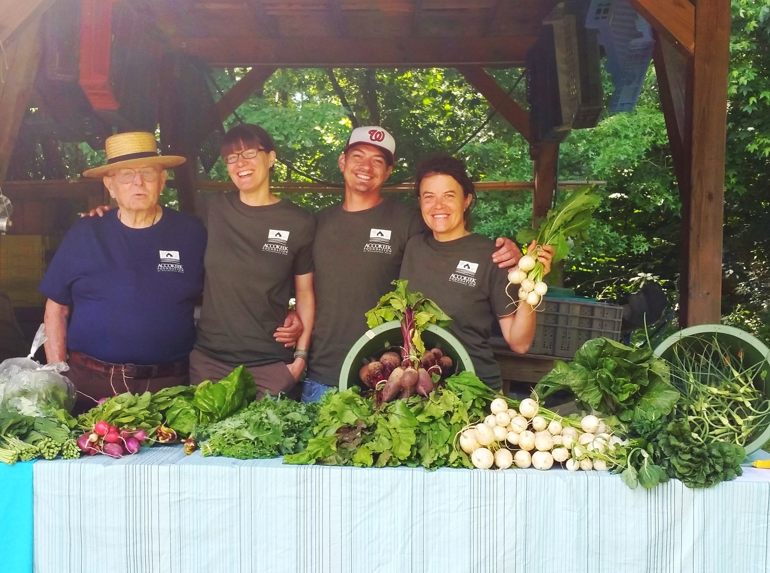 Staff and volunteers at the first market of the season.jpg