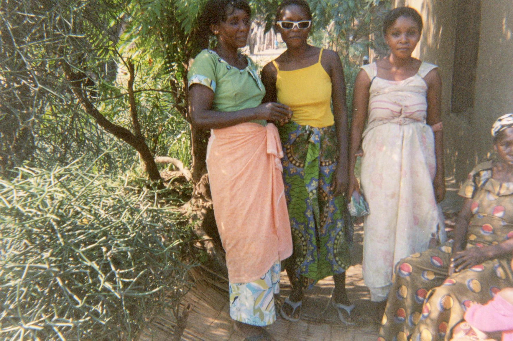 This photo shows how when the girls left the armed groups, we gave them advice at home under a tree with other Mamas from the village. We gave them advice on their behaviour whatever difficulties they faced in their daily lives. 