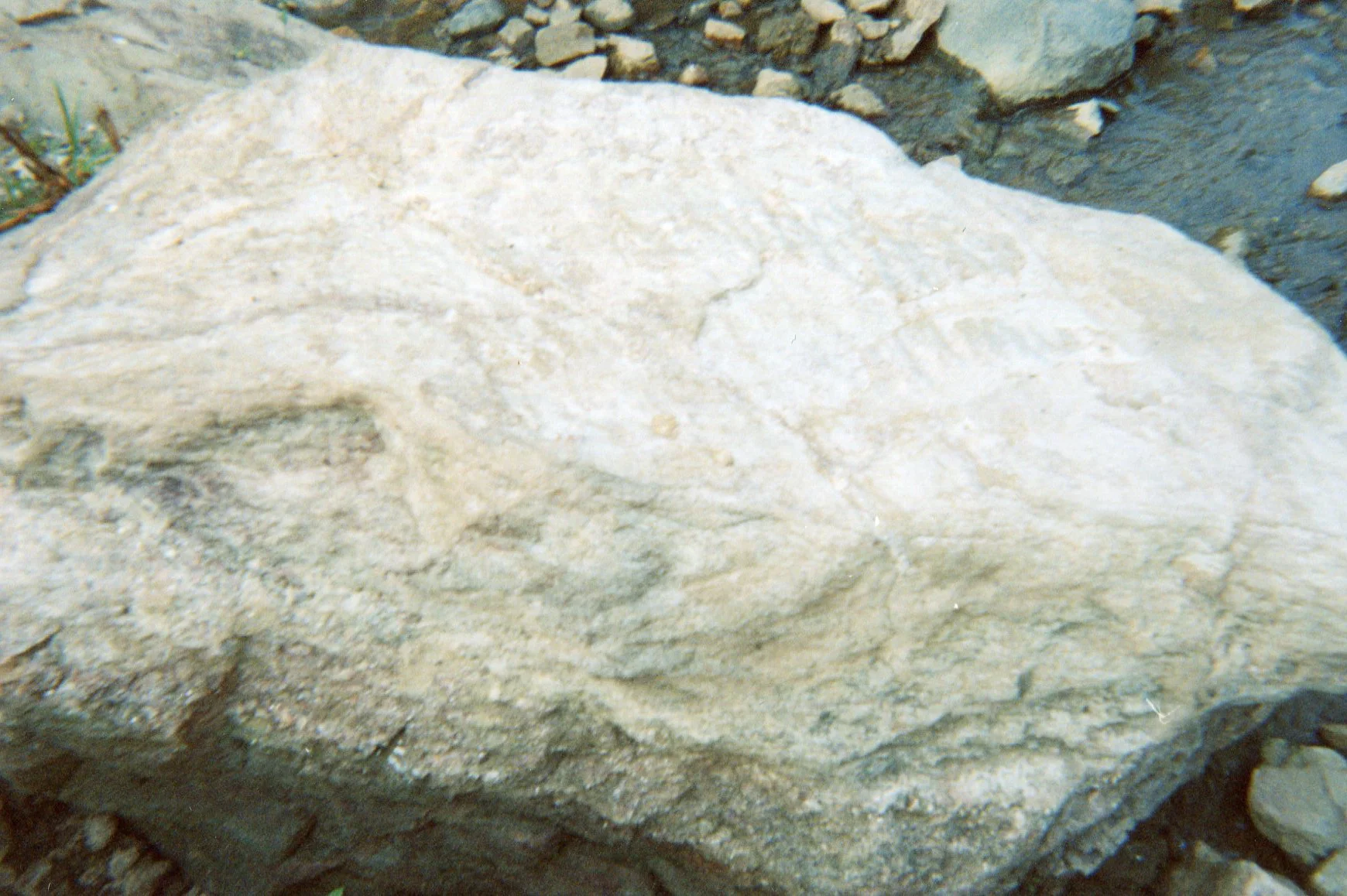 This photo shows the place where the friend of my child died while he was breaking stones after leaving the Mai Mai.