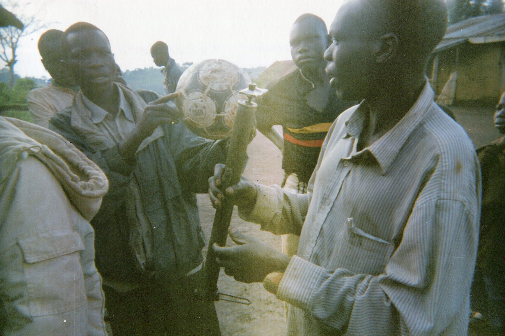  The child is accepted well in the community and plays football with others. 