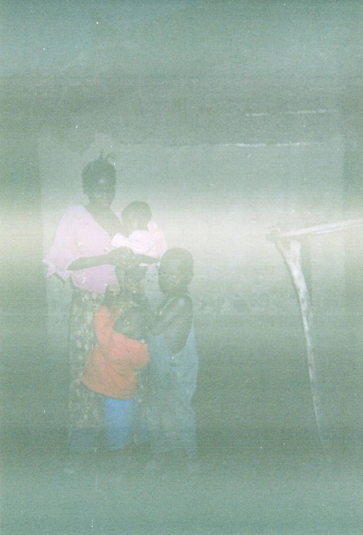 This photo of me and my children shows how we suffered without food and shelter. We continue to suffer until today.