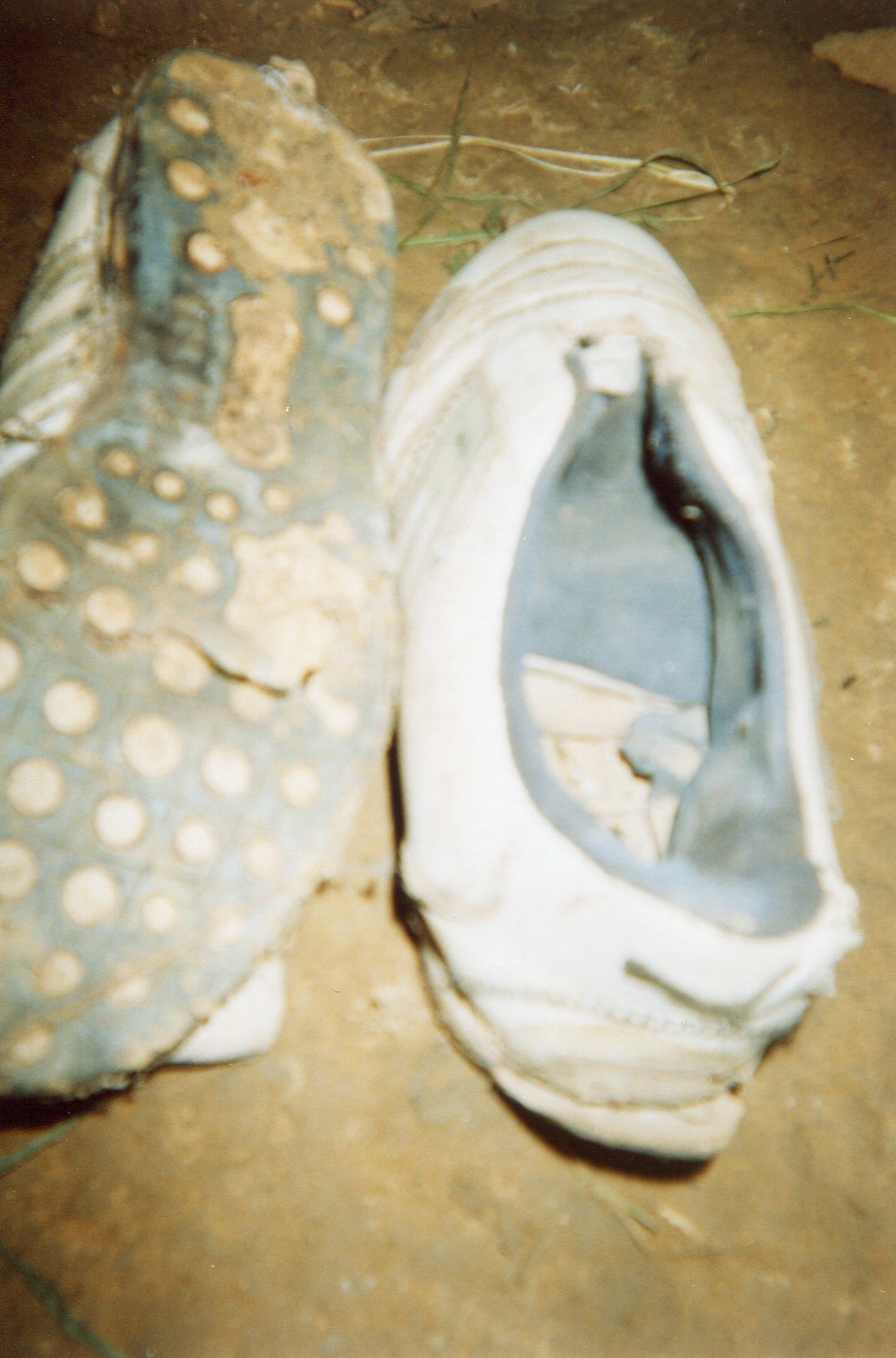  The shoes of a soldier are severely punctured.&nbsp; 