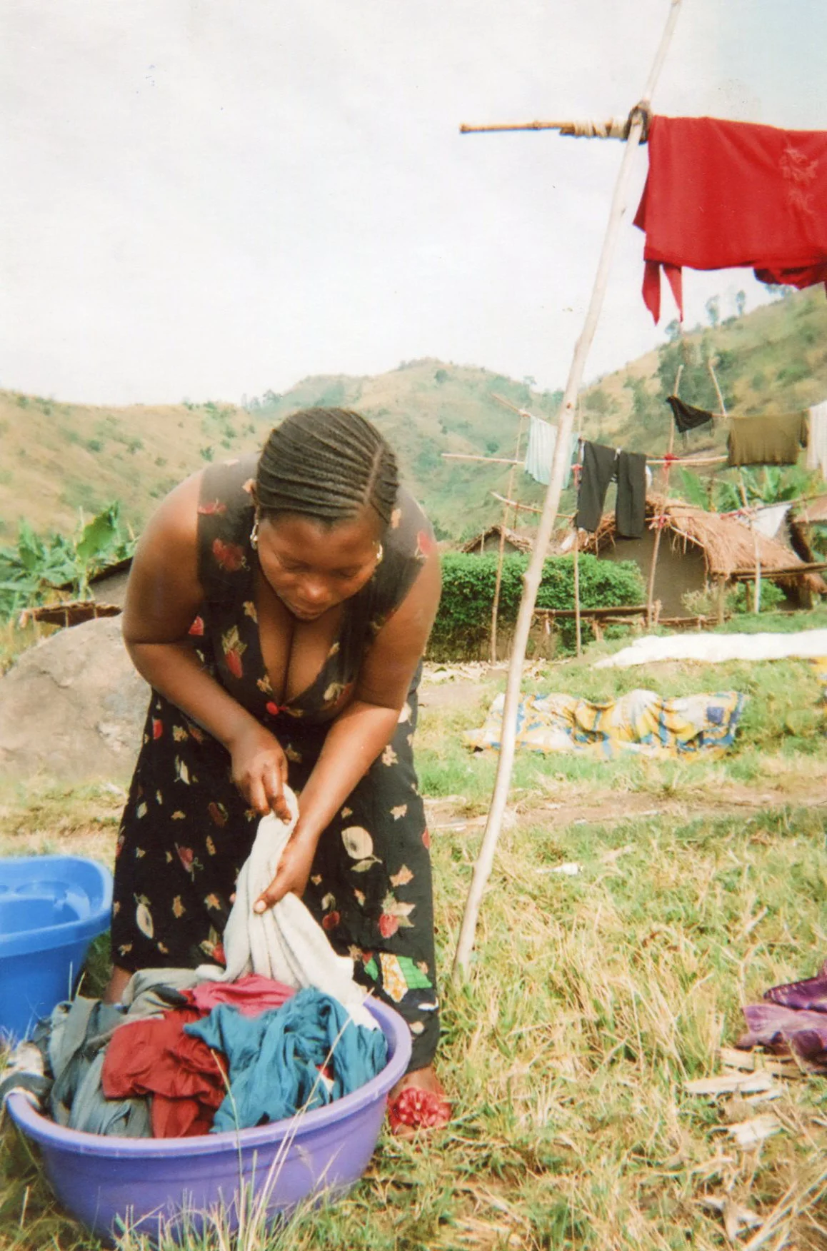 Here I am washing their clothes and they would make me do it quickly beating me with a stick. 