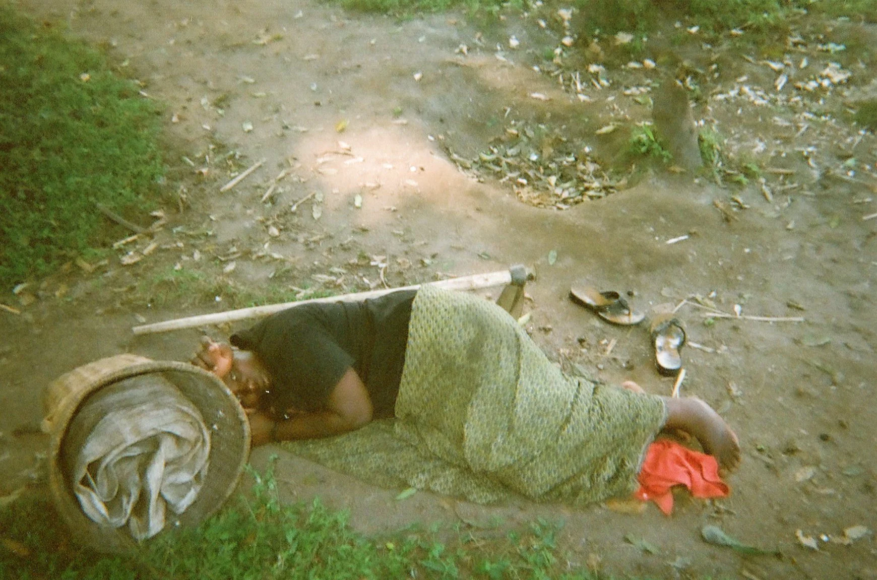 I am coming out of the garden and I meet the Interahamwe and they rape me on the road — then they tied me up and carried me and my hoe that I used for cultivating.