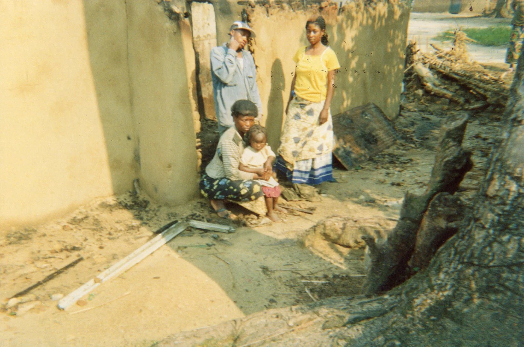 A family's house was burned during the war. 