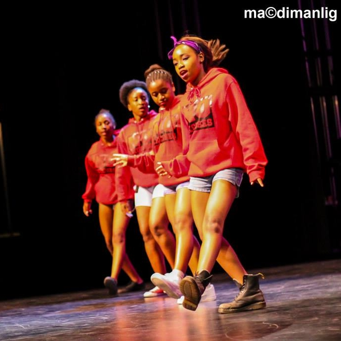 Nataly, far right, performing. Photo by Mac Dimanlig .