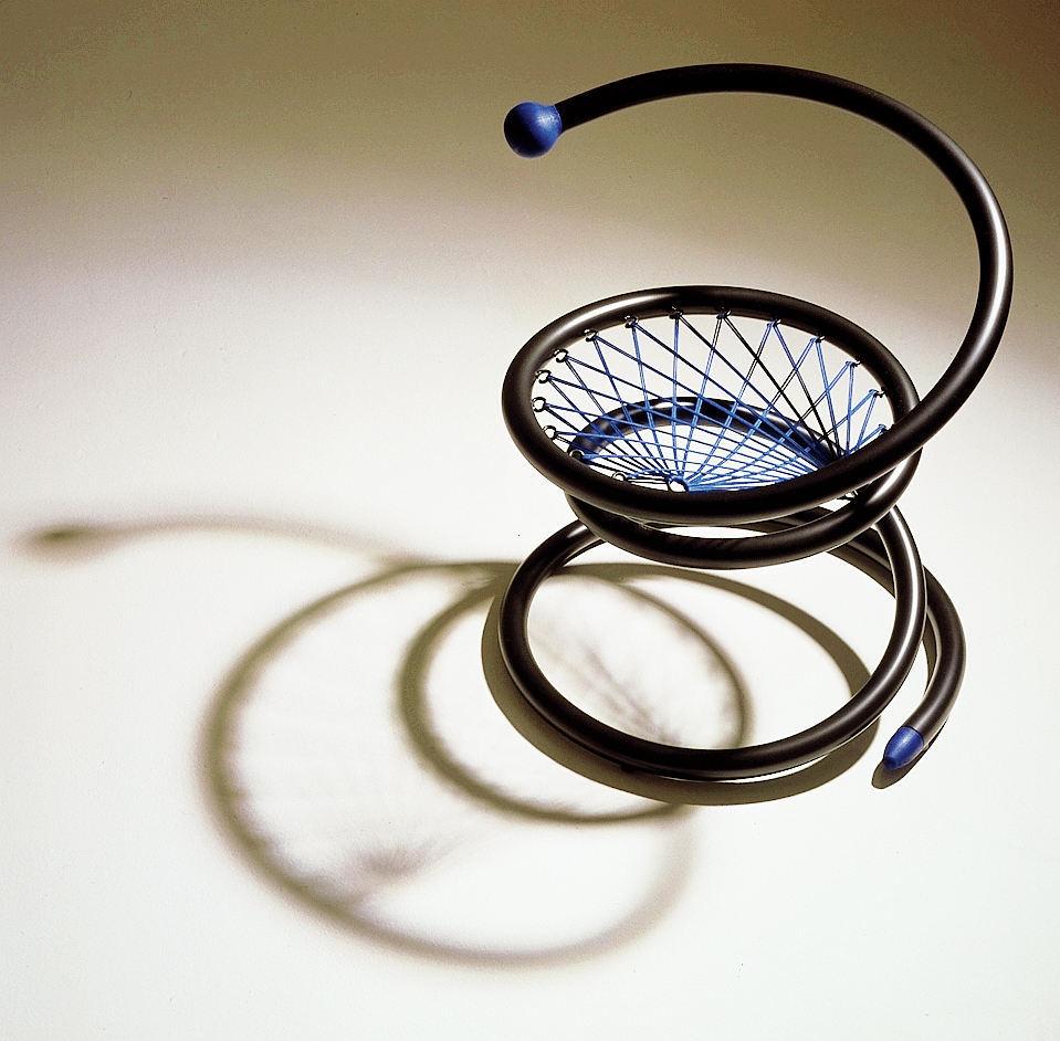 "A coil spring is a symbol of softness and resilience. For a competition in 1975 I attempted to create a chair wound from a long steel tube, a small model of which was designed and built. Some years later I helped to develop a technique for manufacturing this chair." Pyhton Chair, 1975. Made by Cylindra from 1990-2000
