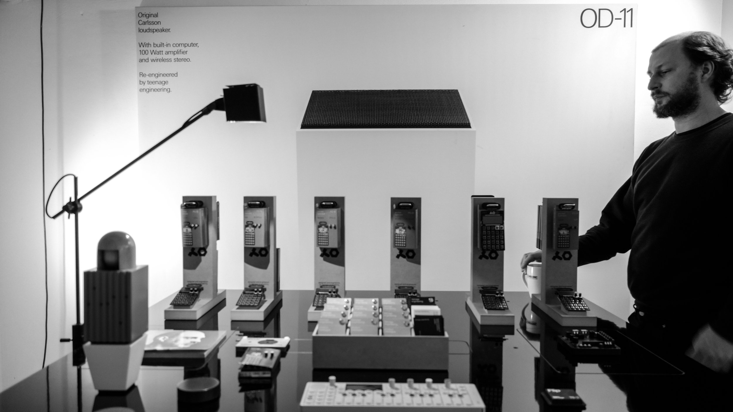 David Möllerstedt together with the Pocket Operator Synthesizer series, the OP-1 synthesizer, the OP-Lab, the Work Light and the OD-11 wireless speaker shown in the background. Photo: Emil Kullänger.