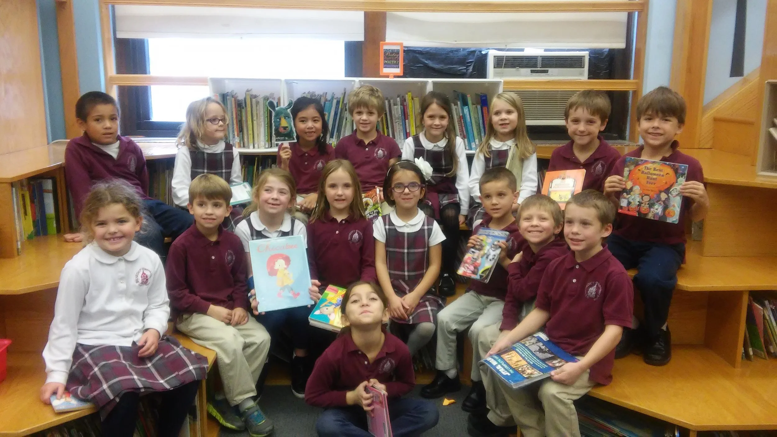 Ms. Peters' class reading with our friend bear!