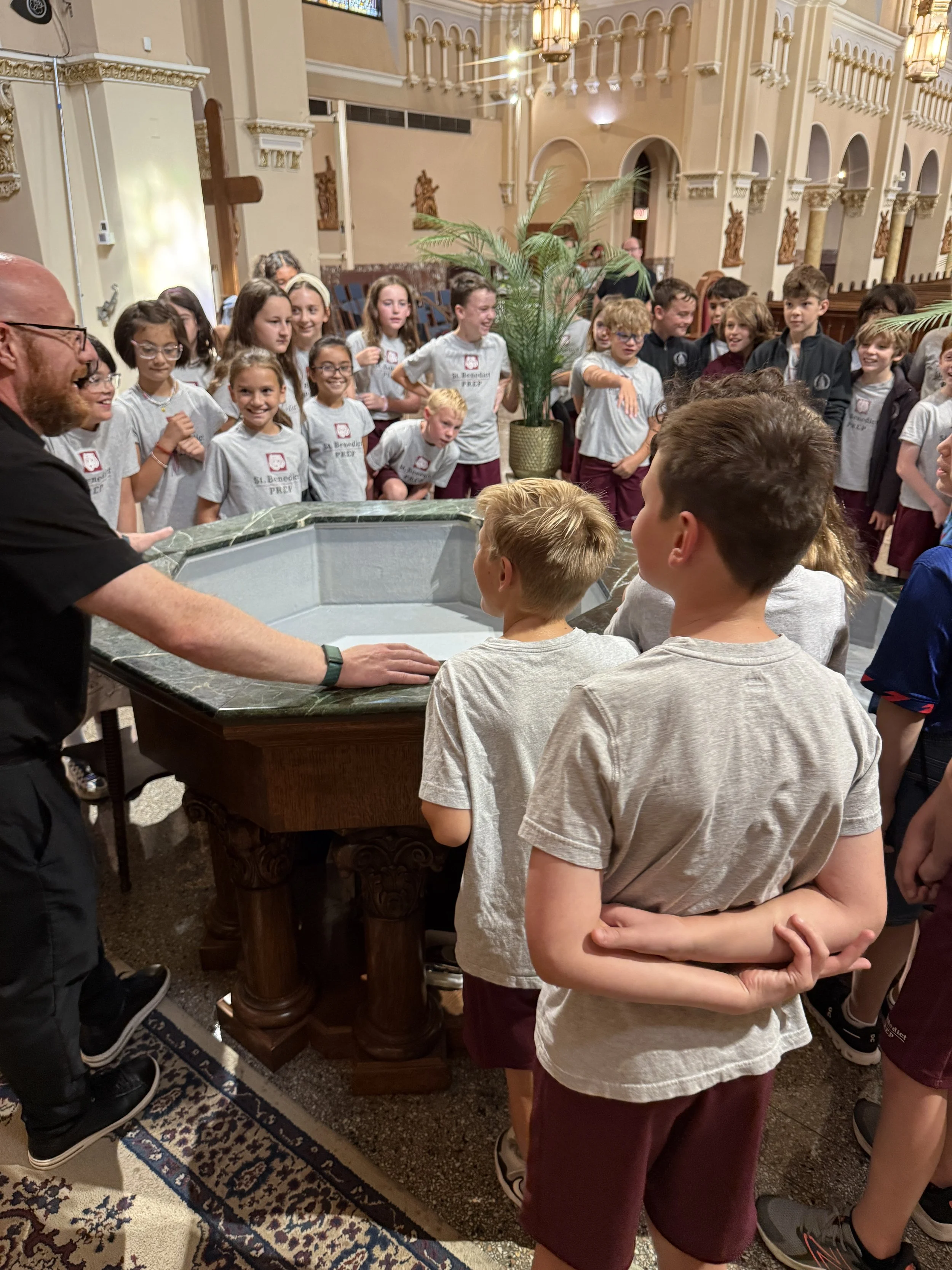 Father Ryan altar server training.jpg