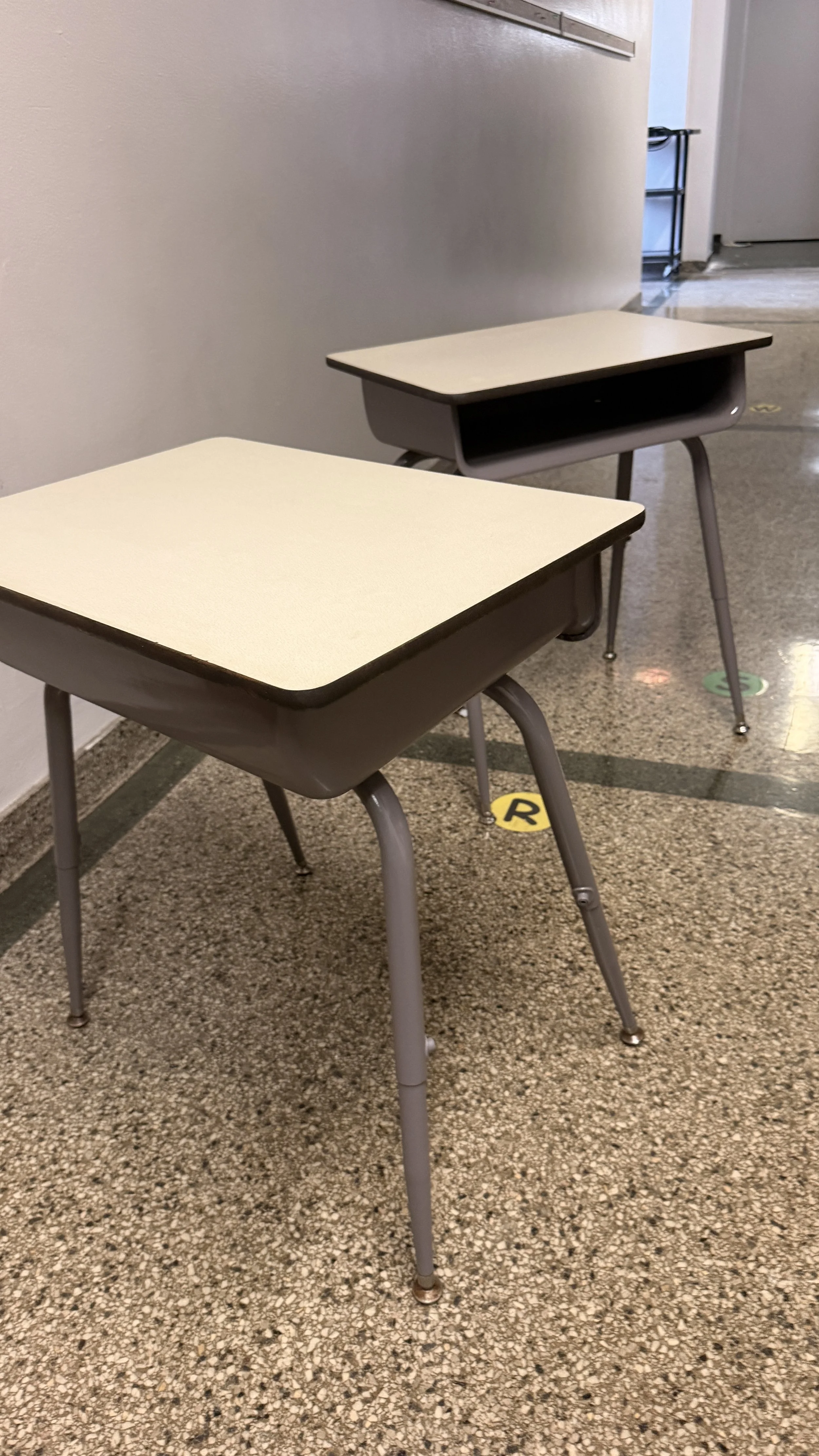 Student desks for grades 2-5 were painted and refurbished. They look like new! 