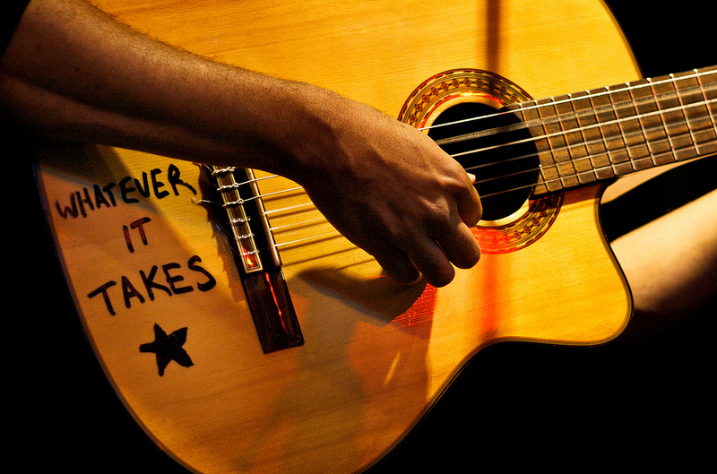  Tom Morello performs as the Nightwatchman at Easy Street Records in Queen Anne. 