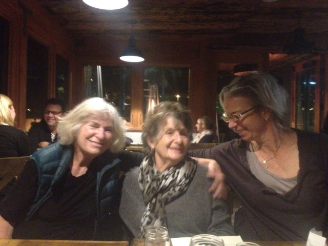 Marcia Burtt, Natalie Wilson and Rebecca August relax after a day of intense painting.