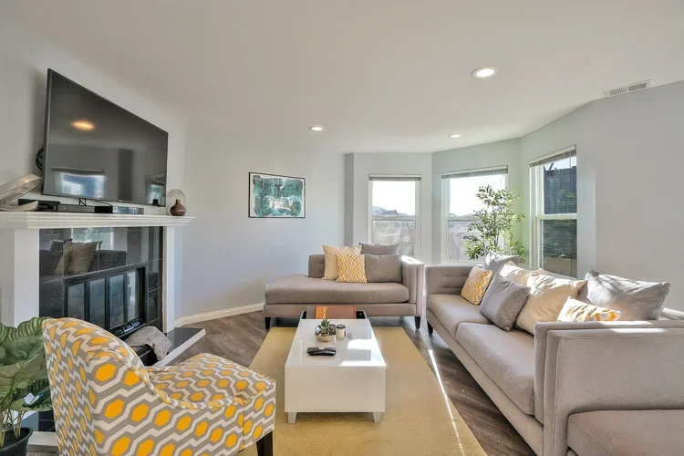 Living+room+couch+TV+windows+galley+style.webp