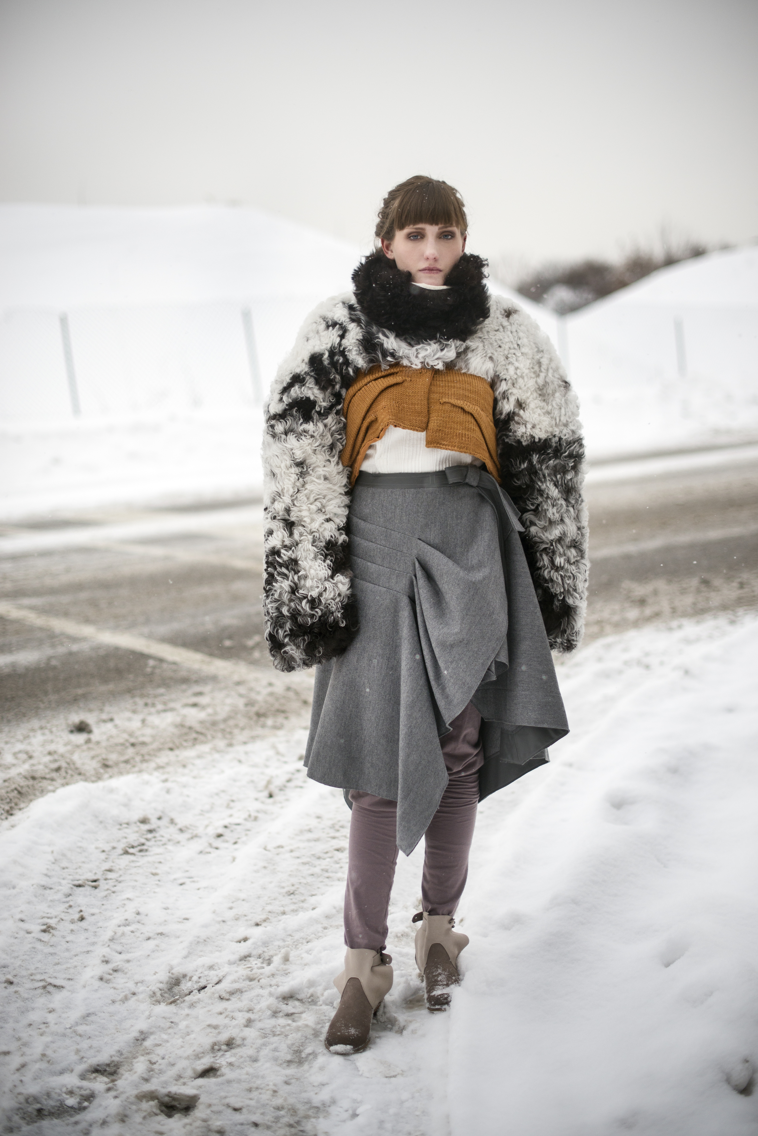 Sheepskin and knit coat,  wool and leather skirt, and knit leggings