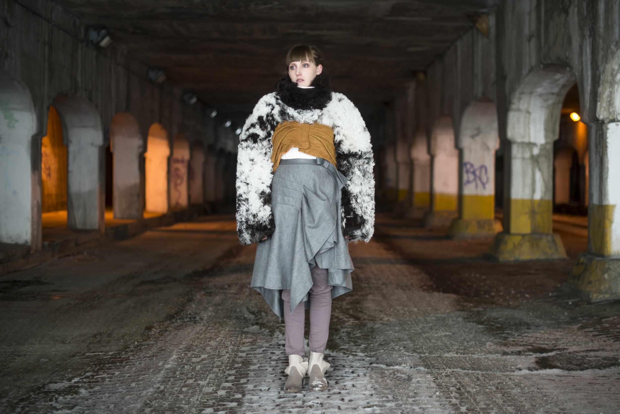 Sheepskin and knit coat, leather and wool skirt, and knit leggings
