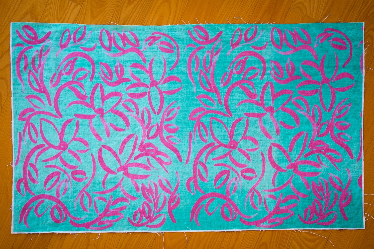 PINK FLOWERS AND FOLIAGE ON TURQUOISE