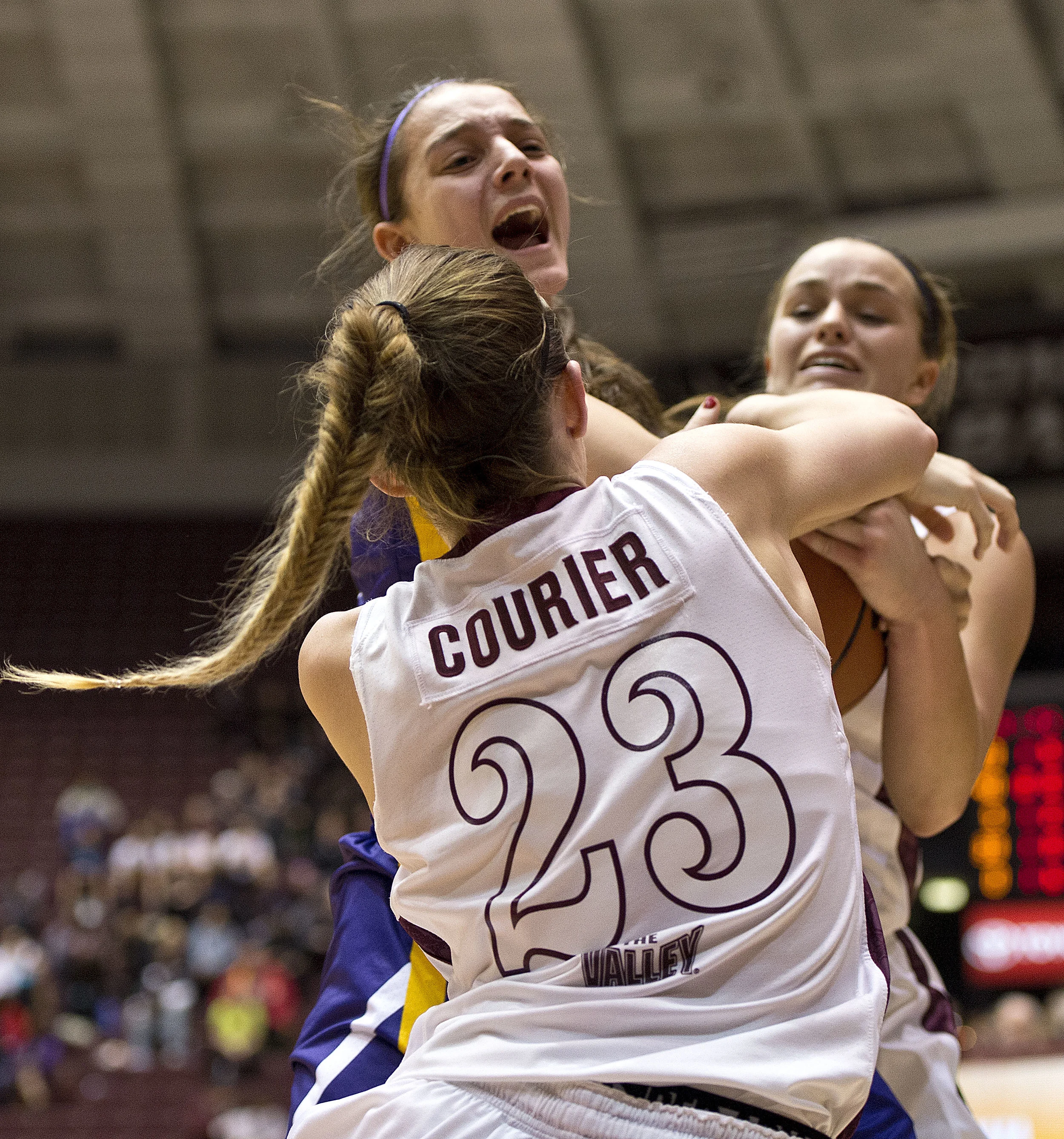 Saluki guards Jordyn Courier and Hannah Shores double team Northern Iowa guard Madison Weekly.