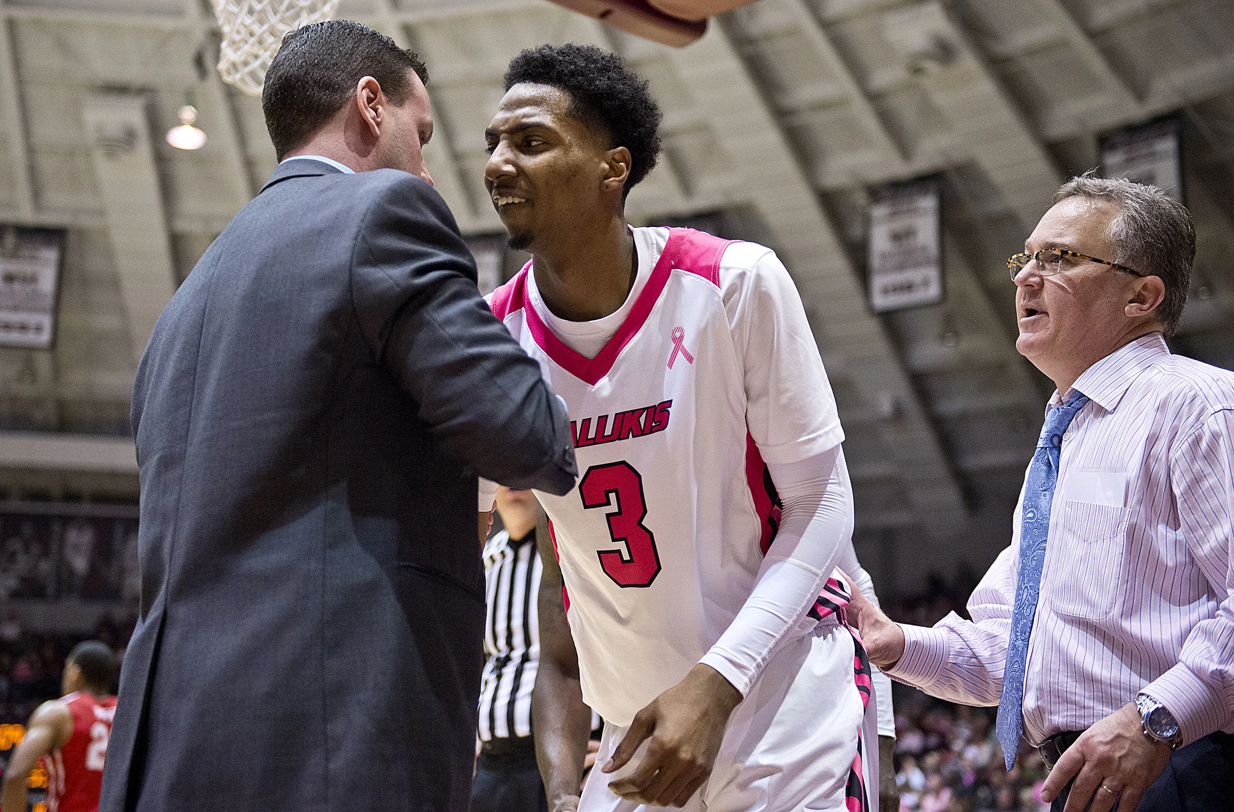 Salukis guard Desmar Jackson is helped up after getting fouled.